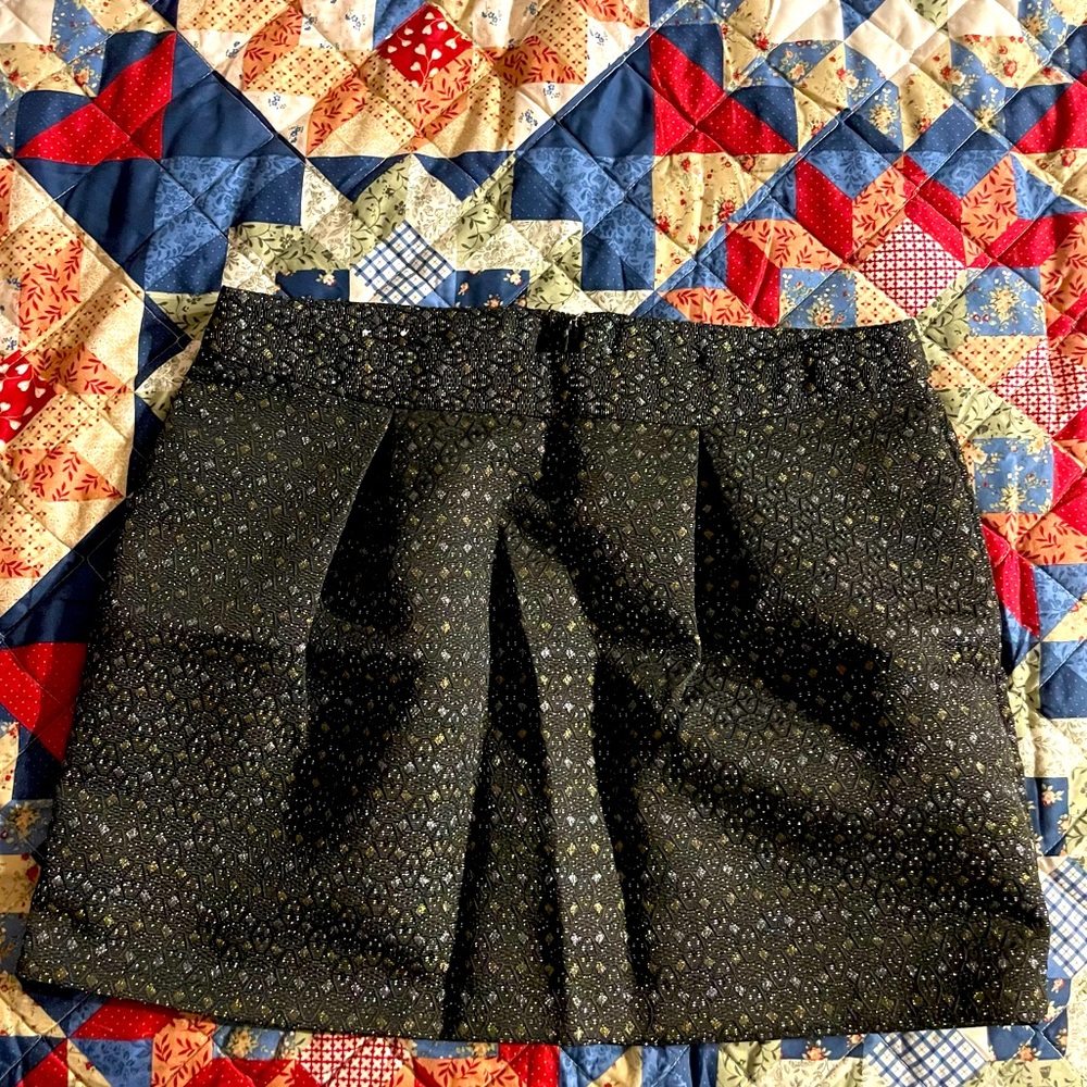 Dress up w/ this Old navy black, gold/silver pattern skirt, size 16, brand new.